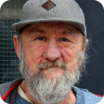 "French" is a senior panhandler stationed at Toronto Queen Street West near Trinity Park